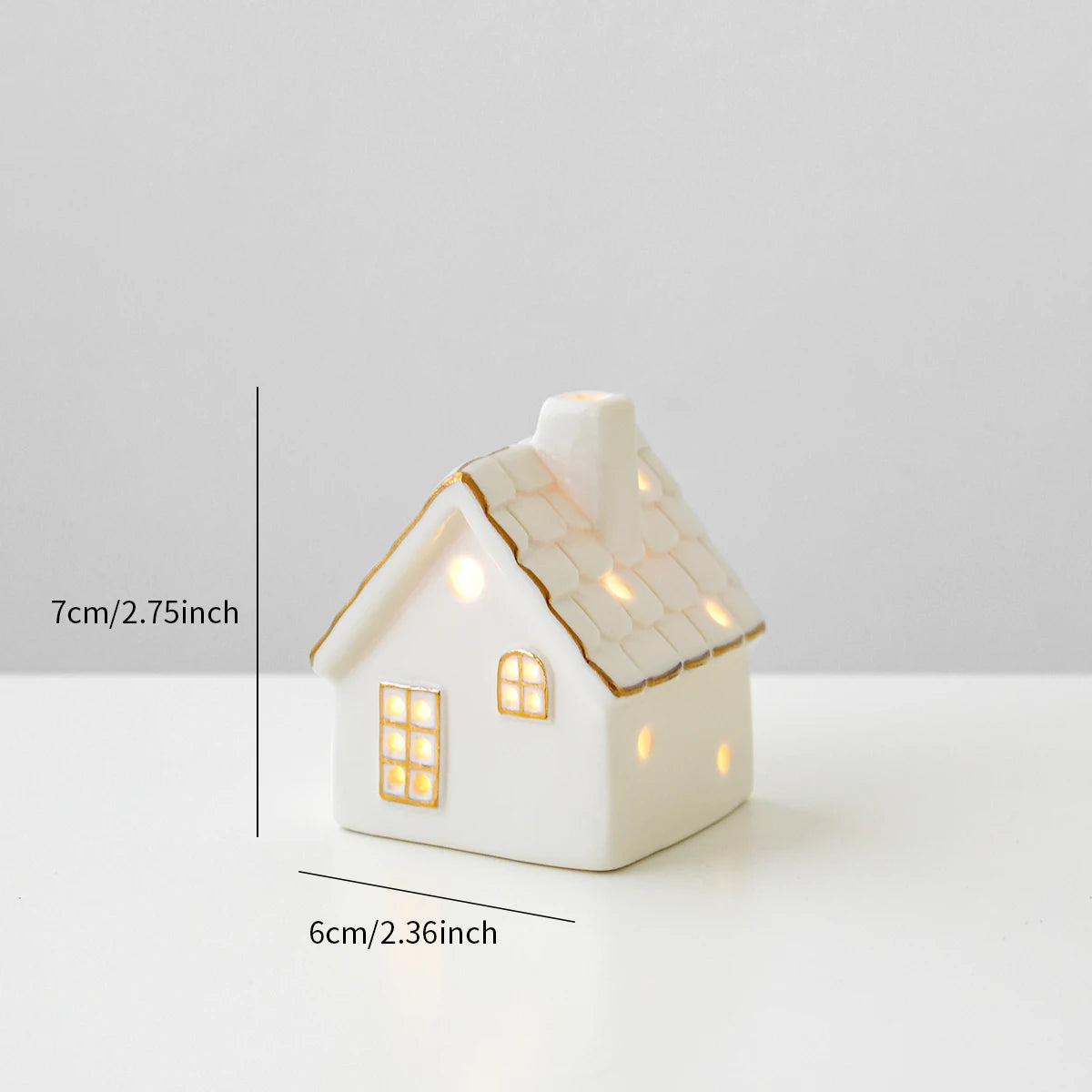 A ceramic Mini Forest Christmas house with lights, designed to create a mini Christmas village scene.