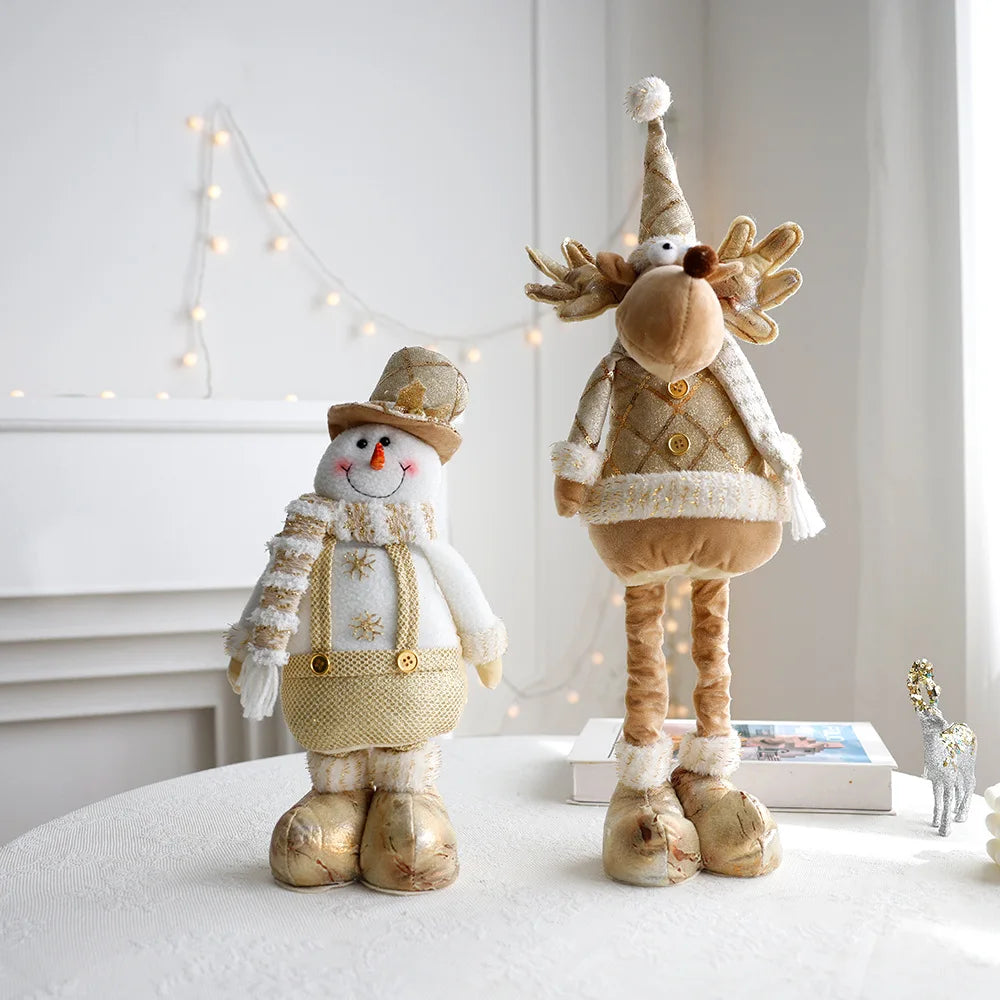 Festive, Christmas soft cloth figurines with telescopic legs featuring snowman and reindeer characters against a white background.