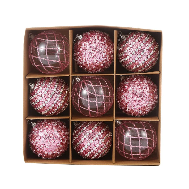 9-piece shiny bauble set in pink. 8 cm plastic ornaments with 3 designs per box.