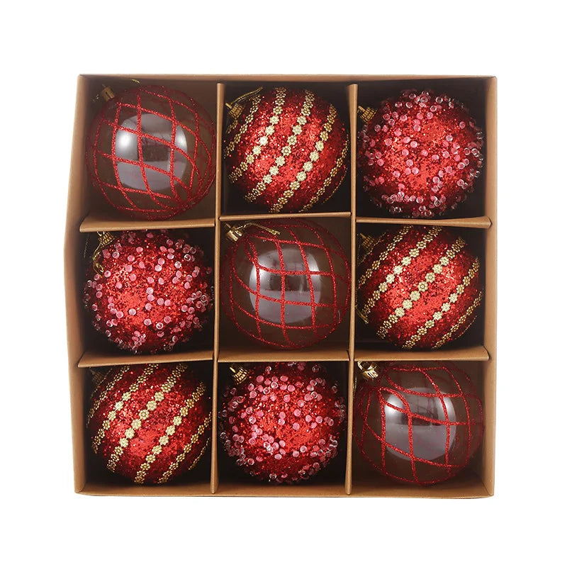 9-piece shiny bauble set in red. 8 cm plastic ornaments with 3 designs per box.