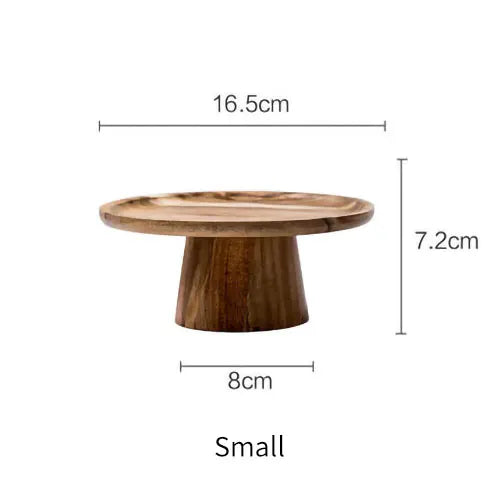 A natural wooden cake stand with dimensions stated