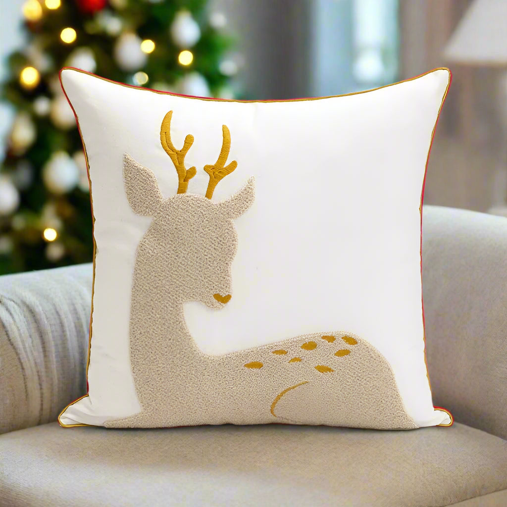 Beige and Gold Christmas Cushion. An embroidered deer design in soft neutral tones.