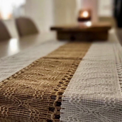 An close-up image of a boho table runner. 
