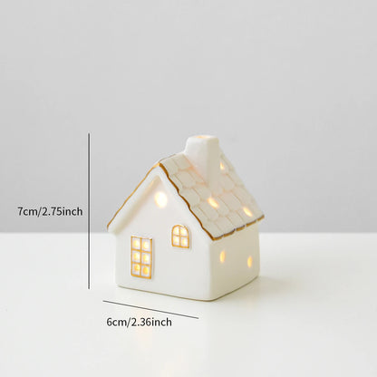 A ceramic Mini Forest Christmas house with lights, designed to create a mini Christmas village scene.