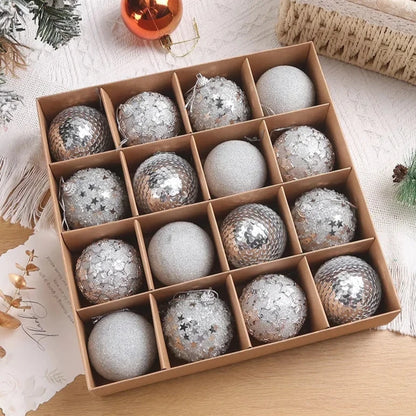 A set of 16 silver sparkly, textured Christmas baubles, presented in open cardboard box.