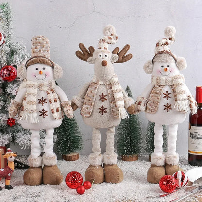 Festive, Christmas soft cloth figurines with telescopic legs featuring snowman and reindeer characters against a festive indoor background. 