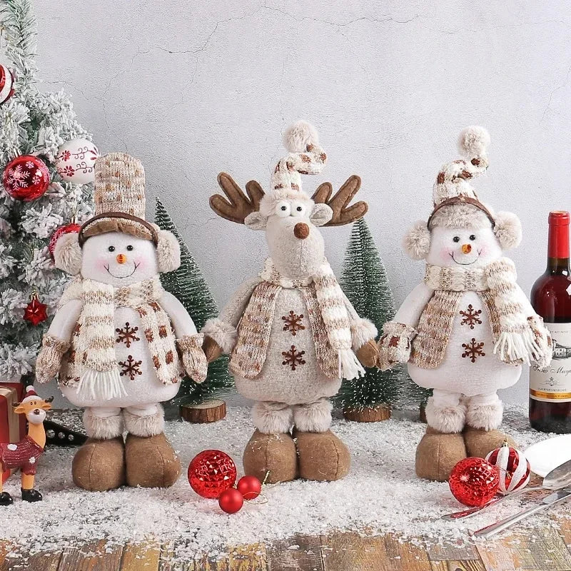 Festive, Christmas soft cloth figurines with telescopic legs featuring snowman and reindeer characters against a festive indoor background. 