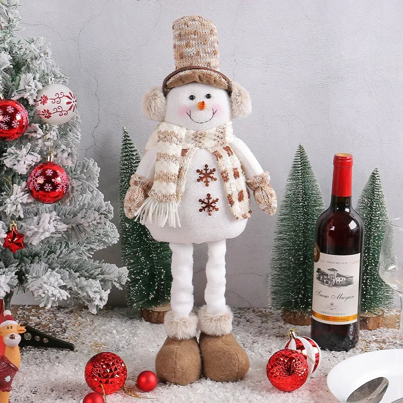 A festive, Christmas soft cloth figurine with telescopic legs featuring a snowman character against a festive indoor background.