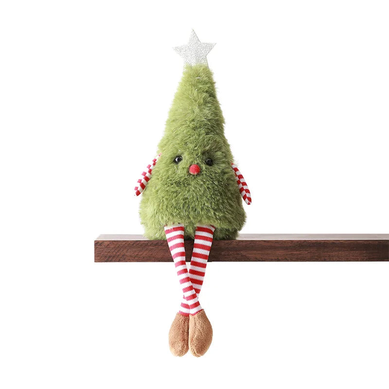 A cute plush Christmas tree, designed to sit on shelves with dangling striped legs. Made from soft synthetic bristle and plush fabric, it features a friendly face, red-and-white arms, and a silver star