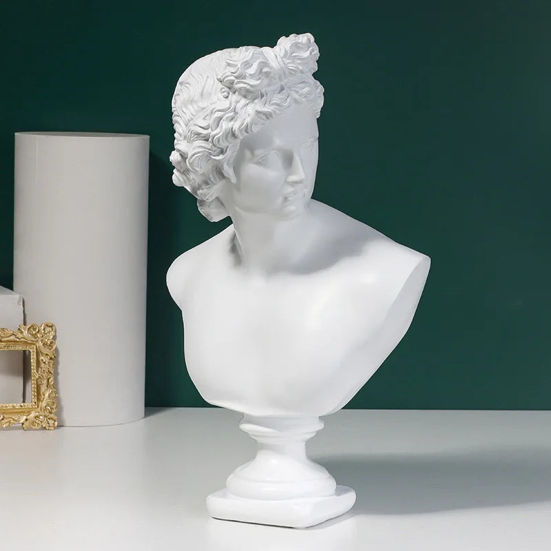 White classical Michelangelo David bust sculpture on a dark green background