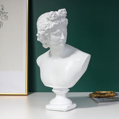 White classical Michelangelo David bust sculpture on a dark green background