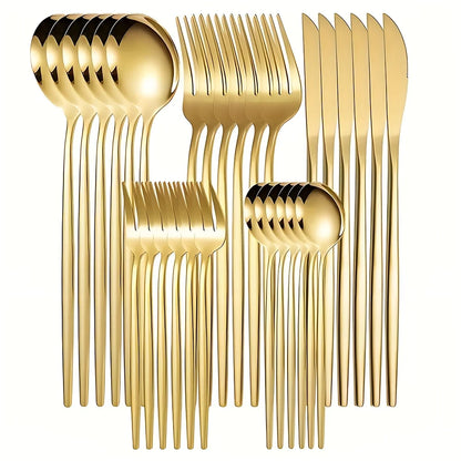 Set of gold cutlery including spoons, forks, and knives on a white background