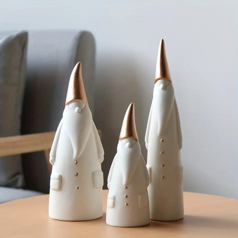 3-piece Santa Claus ornament set. Made of high quality ceramic with bronze detailing. 