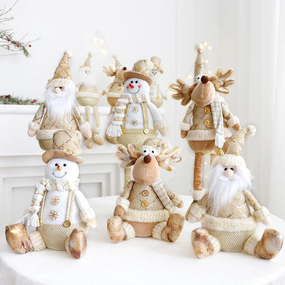 Festive, Christmas soft cloth figurines with telescopic legs featuring santa, snowman and reindeer characters against a white background. 