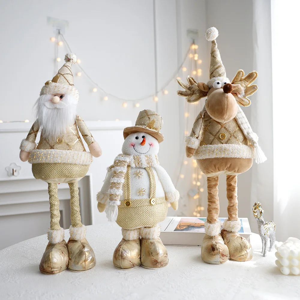 Festive, Christmas soft cloth figurines with telescopic legs featuring santa, snowman and reindeer characters against a white background. 