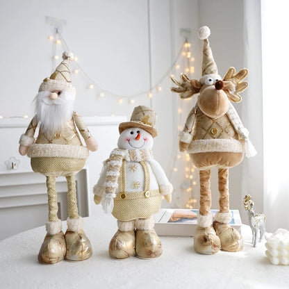 Festive, Christmas soft cloth figurines with telescopic legs featuring santa, snowman and reindeer characters against a white background. 
