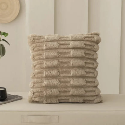 Textured coffee cushion on a neutral background