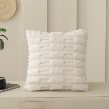 White textured cushion on a neutral background