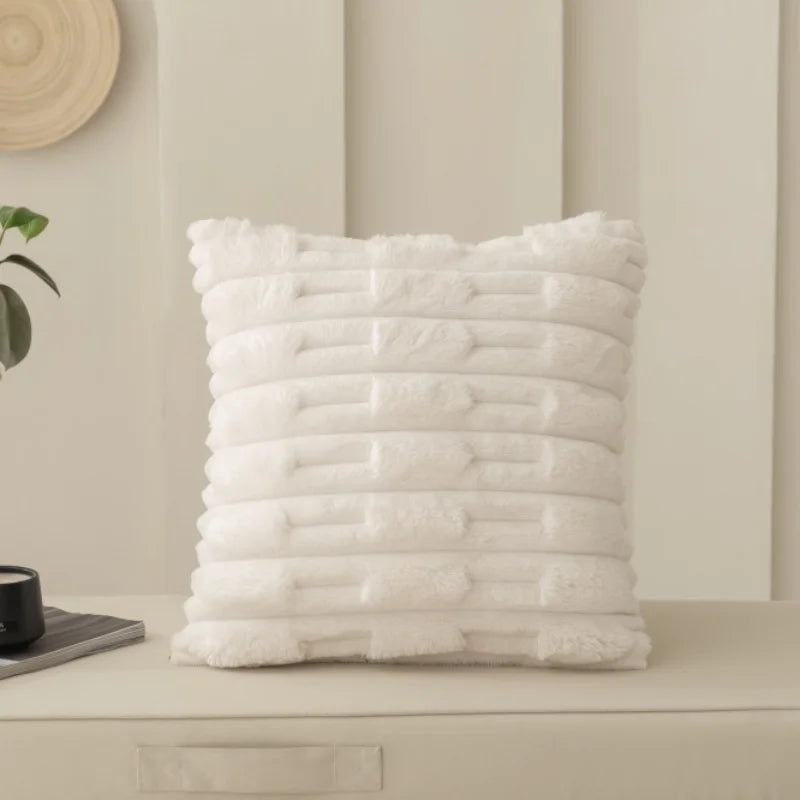 White textured cushion on a neutral background