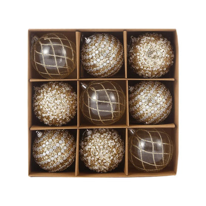 9-piece shiny bauble set in gold. 8 cm plastic ornaments with 3 designs per box. 