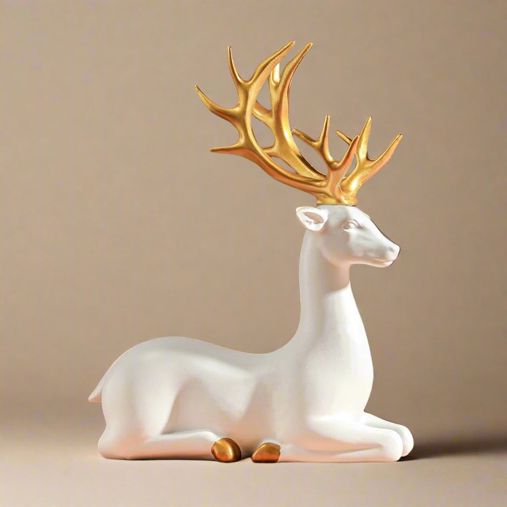 White resin, deer figurine with gold antlers on a brown background