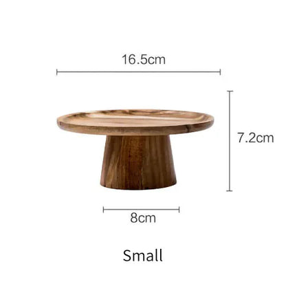 A natural wooden cake stand with dimensions stated 